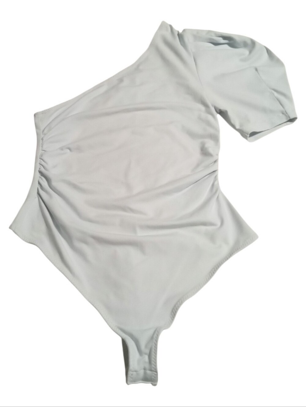Free People Intimately Somethin’ ’Bout You bodysuit in a pale blue. One-shoulder